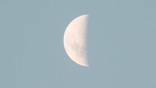 a half moon in the sky
